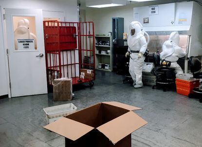 US Defense Department employees screening mail at a facility near the Pentagon.