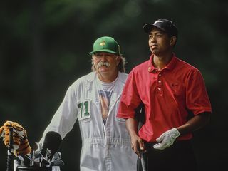 Tiger Woods with his caddie at The Masters in 1997