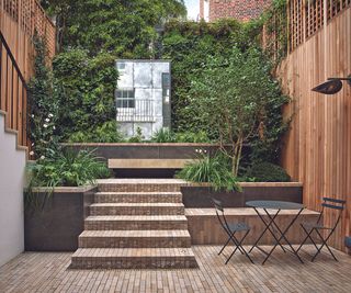 Terrace with steps up to mirrored area