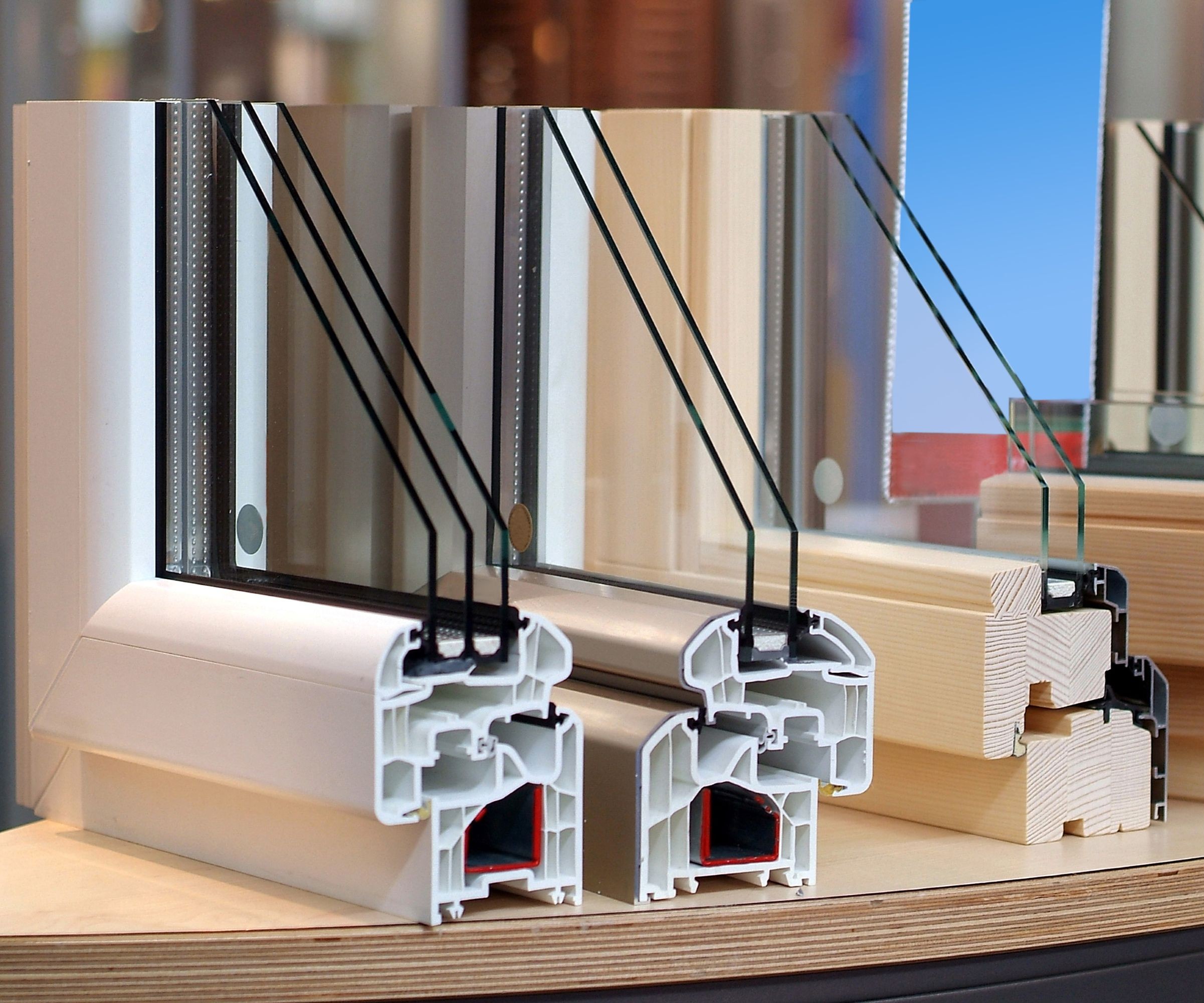 Three examples of windows in upvc, aluminium and timber which are cross sectional so you can see the double and triple glazing
