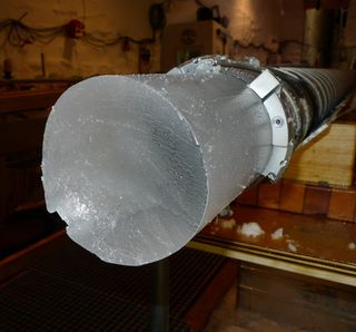 Ice core pulled from the Greenland ice sheet by the NEEM project.