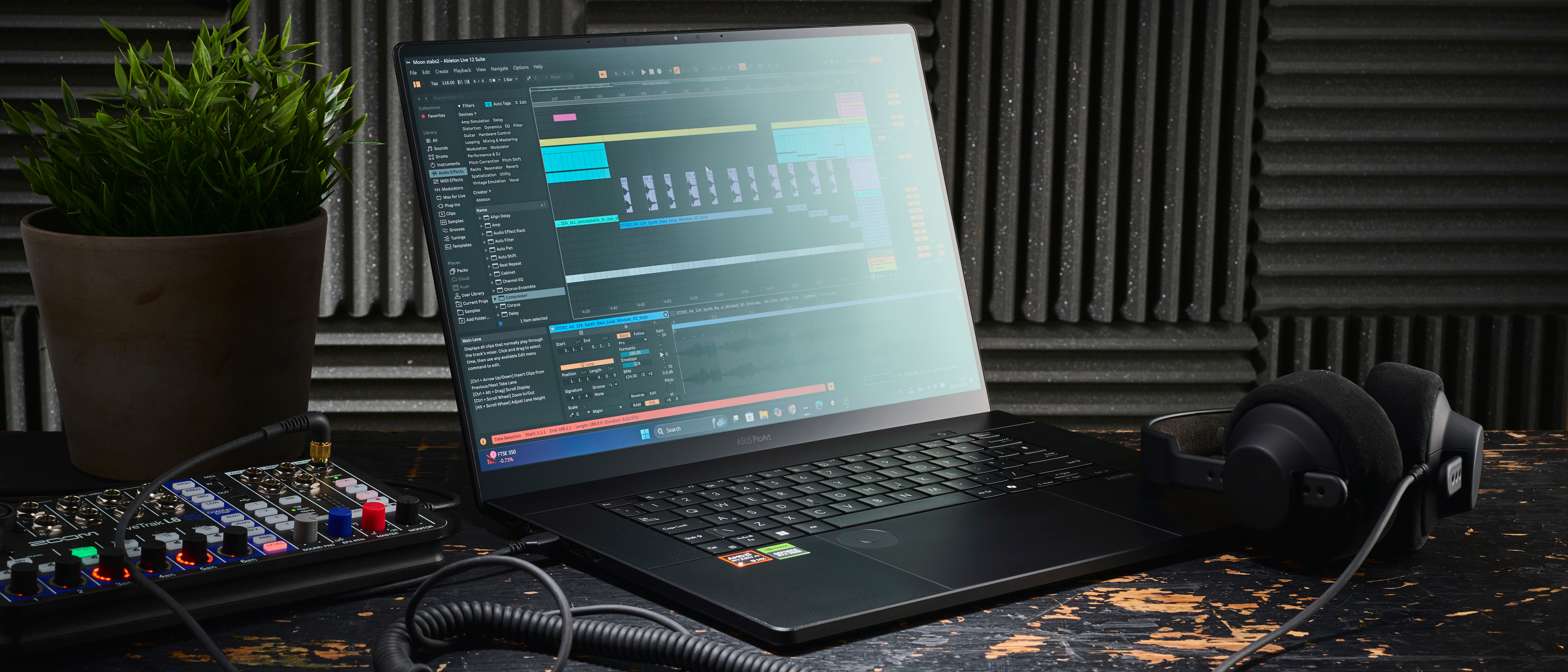 An Asus ProArt P16 laptop on a studio desk