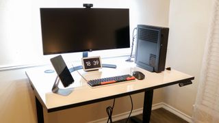 Uplift V2 desk with a desktop pc and ultrawide monitor