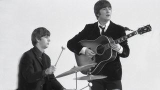 Ringo Starr & John Lennon (playing Gibson J160E acoustic guitar) performing during the filming of "A Hard Day's Night", at the Scala Theatre