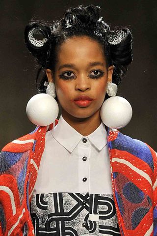 Black model with rollers in the Louise Gray show, A/W 2013,