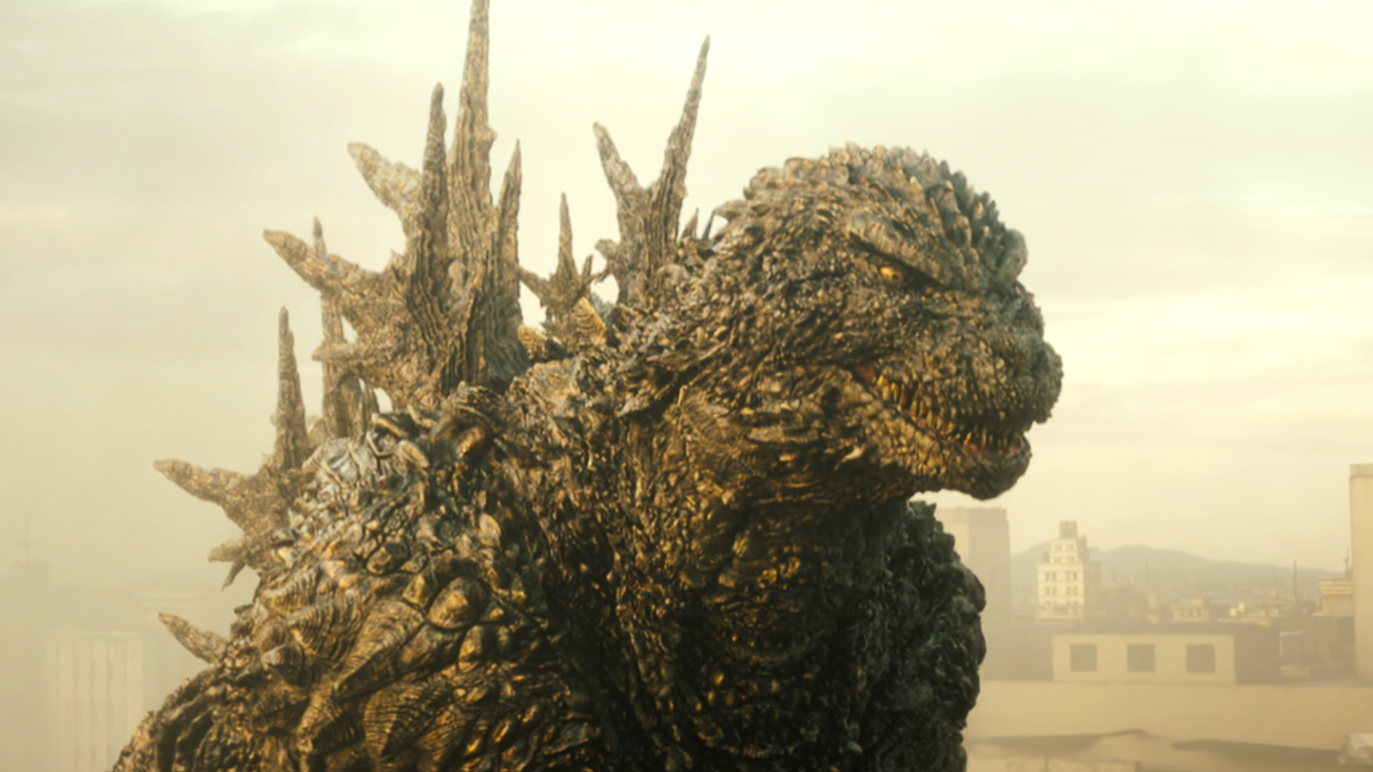 The more beastly, bumpy, dark grey design of Godzilla in Godzilla Minus One.