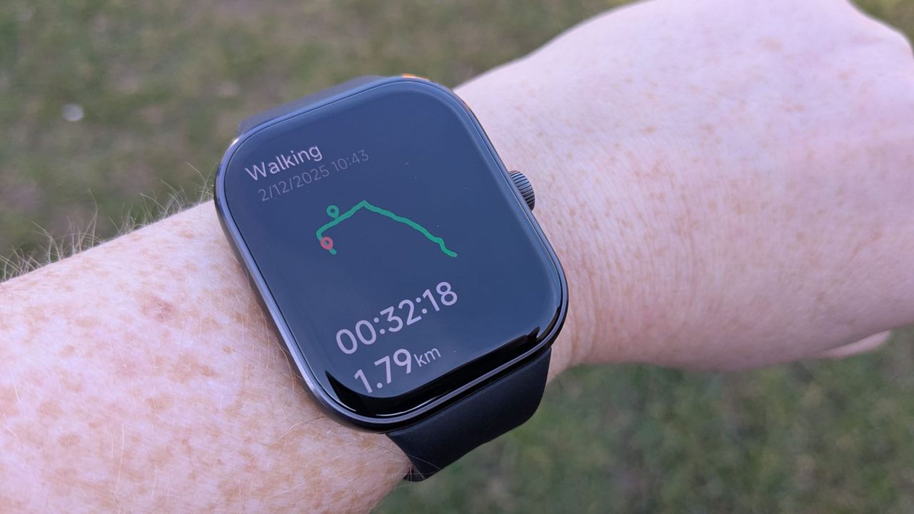 Reviewer wearing the Redmi Watch 5 showing the walking map generated by their workout.