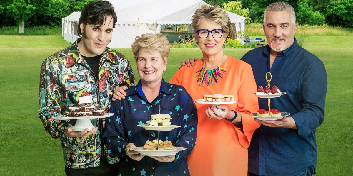 Great British Baking Show Noel, Sandi, Prue, and Paul holding desserts