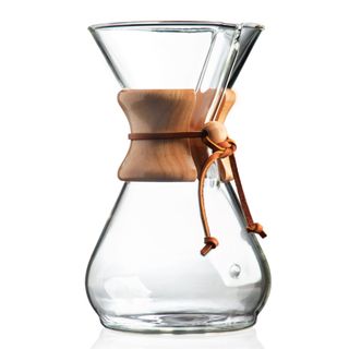 A Chemex pour-over coffee maker against a white background