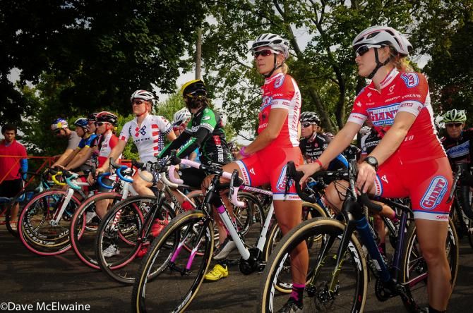 The Elite Women line up for a tribute lap to Amy Dombroski who was tragically killed this week in Belgium