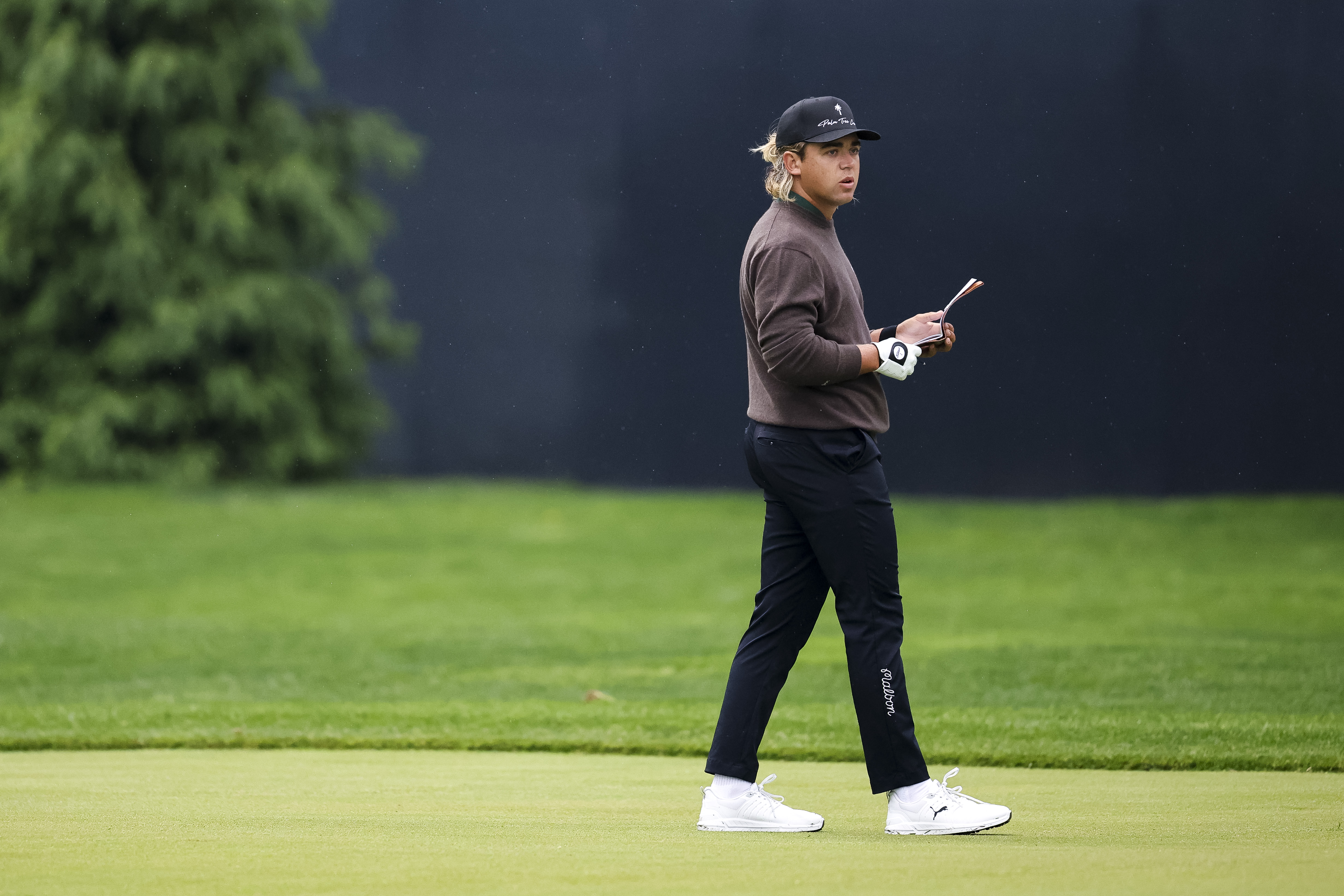 Garrick Higgo walks the first fairway during the first round of the PGA Championship at Aronimink Golf Club