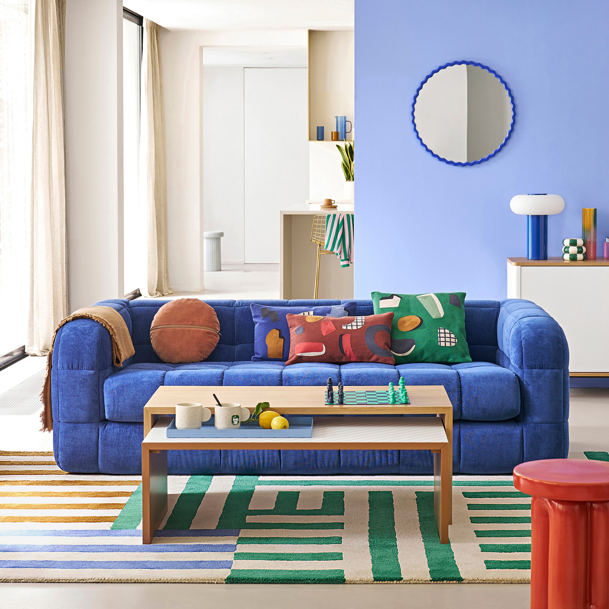 La Redoute&#039;s Pieta sofa in blue in a colourful living room