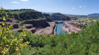 Panoramatic view from Gostry Verkh of Korolevo quarry with Korolevo II site.