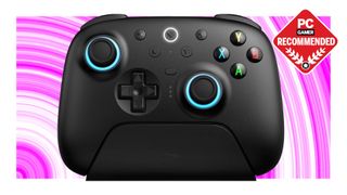 The 8BitDo Ultimate 2 Wireless Controller floats in the swirling pink PC Gamer recommended void.
