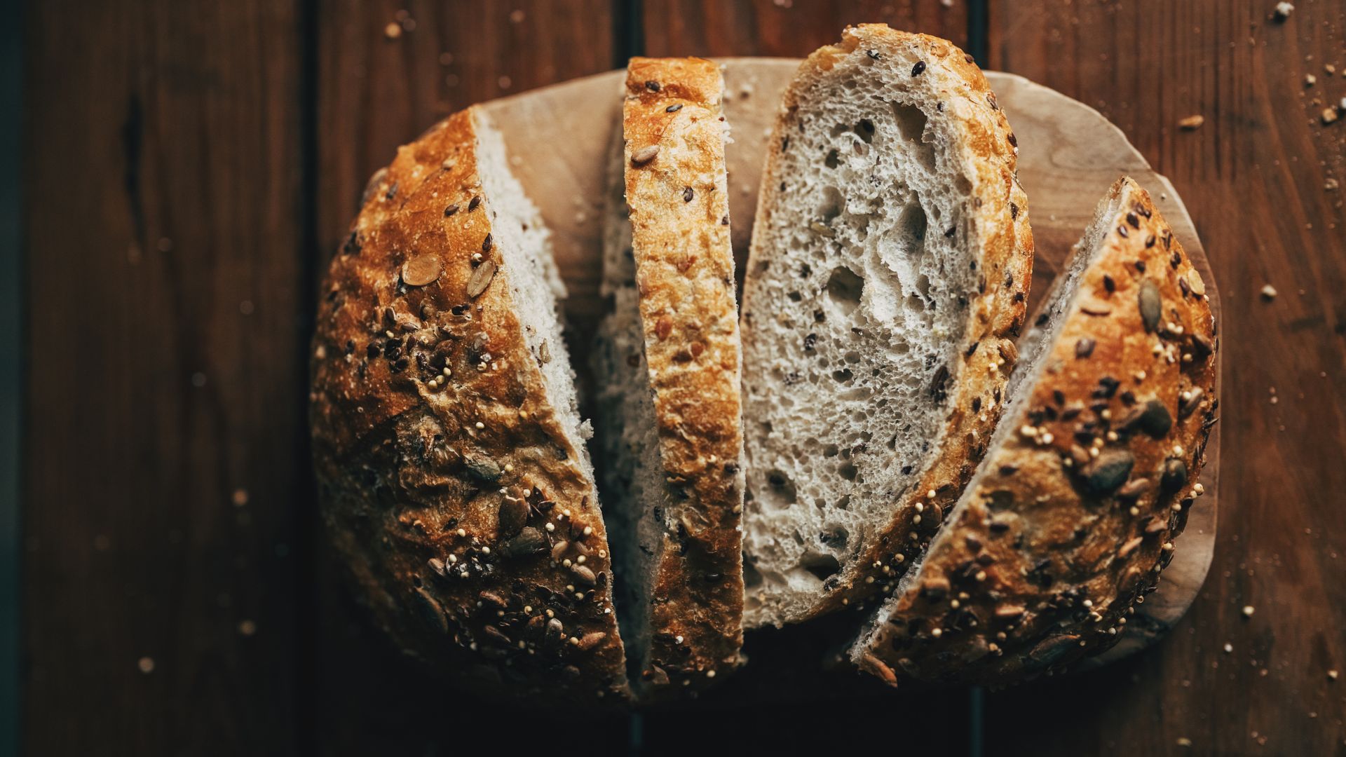 Wholewheat bread on wooden chopping board