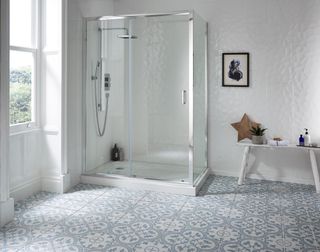 patterned flooring with chrome shower enclosure