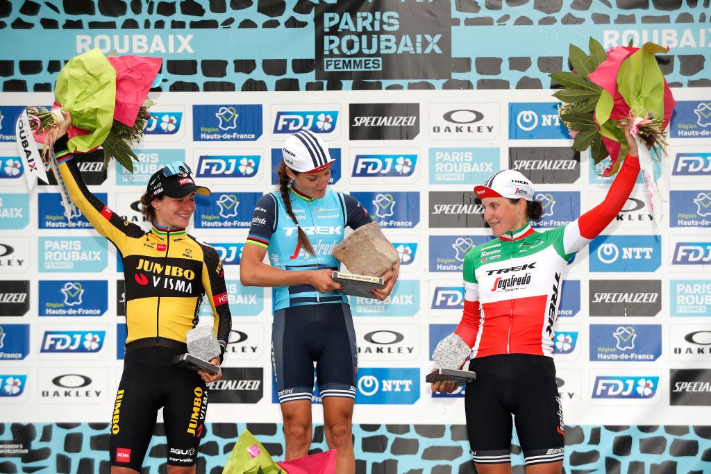 ROUBAIX FRANCE OCTOBER 02 LR Marianne Vos of Netherlands and Jumbo Visma Team on second place stage winner Elisabeth DeignanArmitstead of United Kingdom and Team Trek Segafredo and Elisa Longo Borghini of Italy and Team Trek Segafredo on third place pose on the podium during the podium ceremony after the 1st ParisRoubaix 2021 Womens Elite a 1164km race from Denain to Roubaix ParisRoubaixFemmes ParisRoubaix on October 02 2021 in Roubaix France Photo by Bas CzerwinskiGetty Images