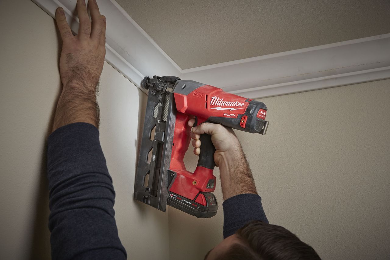 Milwaukee M18 16g nail gun putting up coving