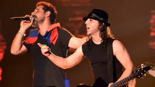 Serj Tankian and Daron Malakian of System Of A Down onstage in 2014