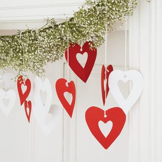 christmas paper heart and leafy garland decorations