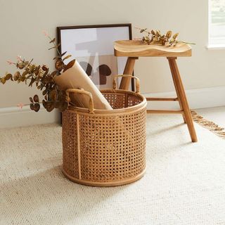 cane basket on carpet floor