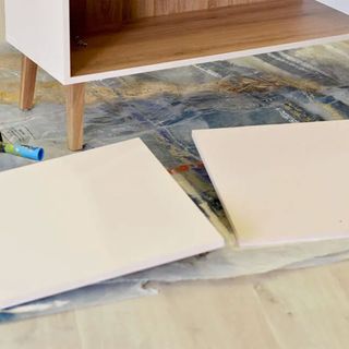 wooden sideboard with white doors