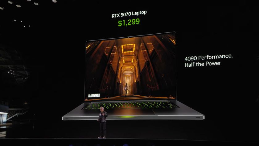 Nvidia CEO Jensen Huang standing in front of a screen showing an RTX 5070 laptop at CES 2025.