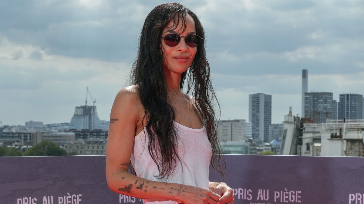 Fashion People Are Elevating "Boring" White Tanks By Wearing Them With This Elegant Skirt Trend Instead of Jeans