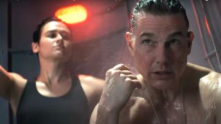Katy O'Brian stands over Tom Cruise as he showers for warmth in Mission: Impossible - The Final Reckoning.