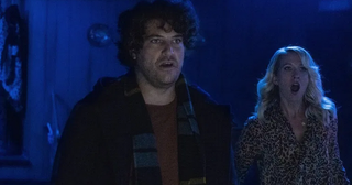 Anna Camp and Adam Pally are having a bad time in the Creepshow Holiday Special.