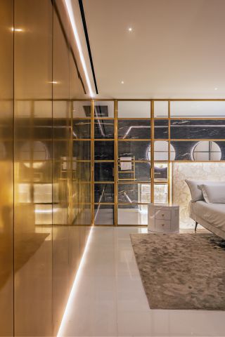 golden bedroom at Tel Aviv apartment by Alex Meitlis