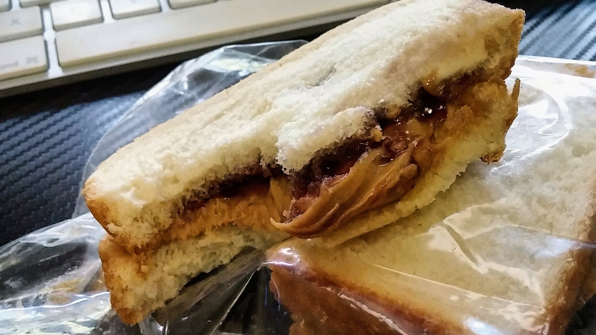 A thick peanut butter and jelly sandwich.