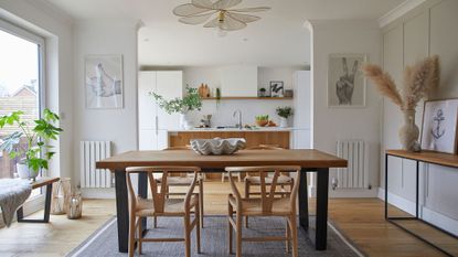 Wooden table in white kitchen diner