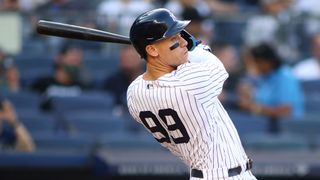 Aaron Judge of the New York Yankees looks at the home run he just hit. He looks to break records at the Red Sox vs Yankees live streams this week.