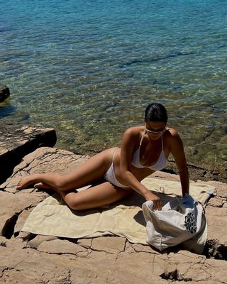 @isabellecoheen wearing a bikini on the beach