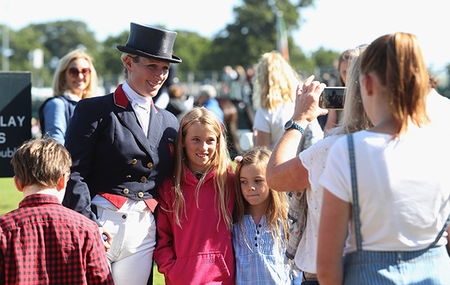 Celeb status: Zara Tindall poses with some young fans after her dressage test