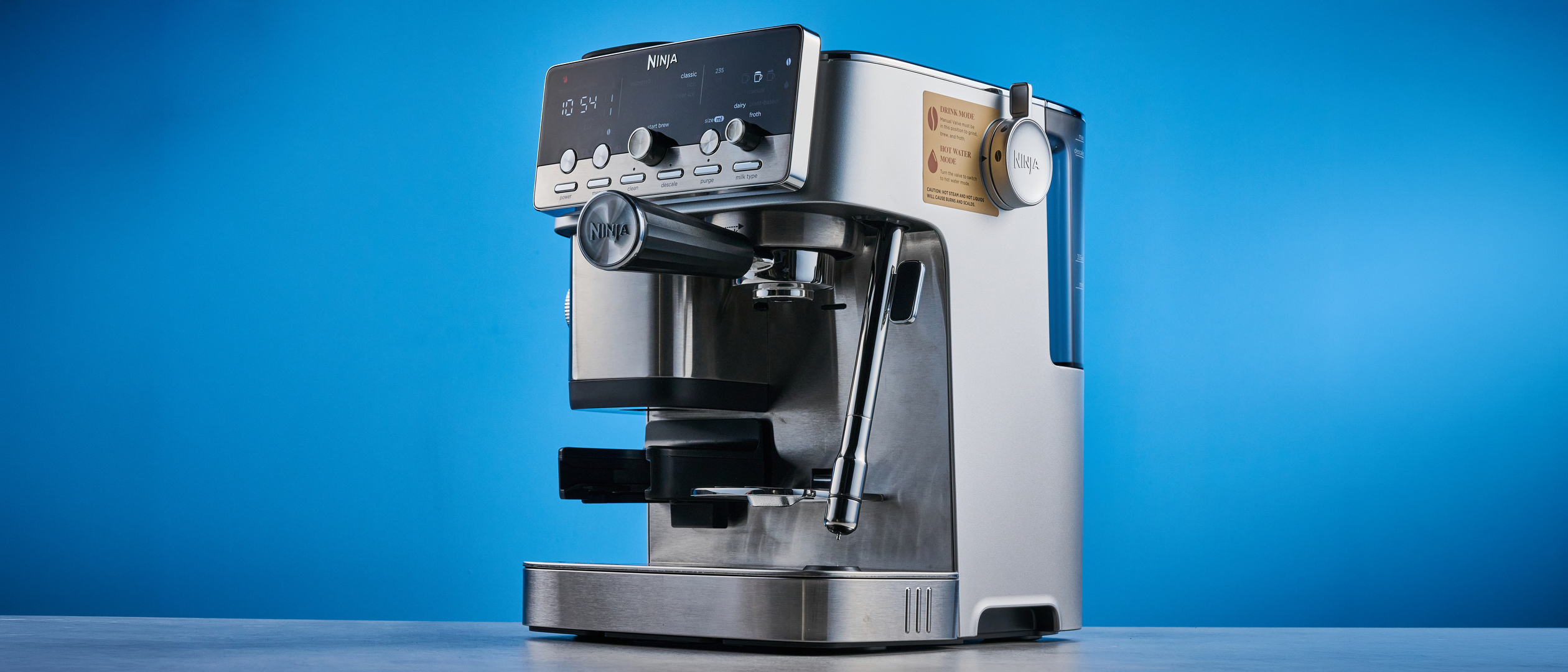 the ninja luxe cafe mini plus photographed against the blue tom's guide background