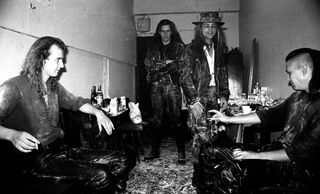The band backstage in 1990, on tour supporting the Elizium album