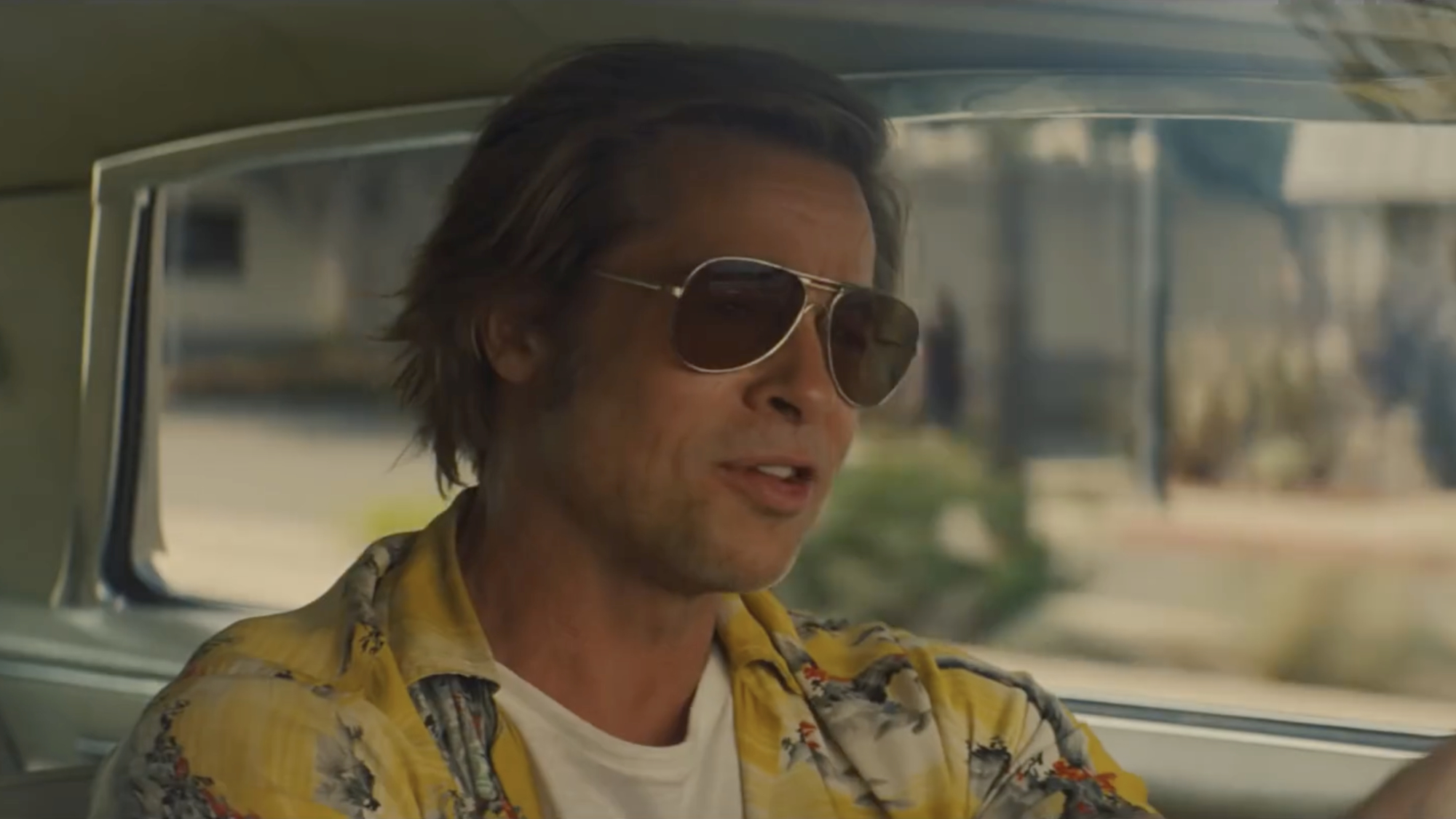 Cliff Booth (Brad PItt) drives in Once Upon a Time in Hollywood.
