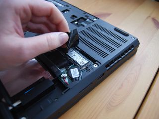 Pull the plastic shielding off of the SSD.