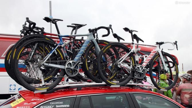 Two custom painted Canyon Aeroad CFs sit atop the Katusha team car