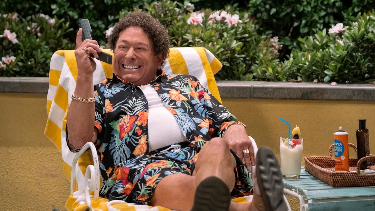 Don Stark&#039;s Bob talking on cell phone while sitting in beach chair in That &#039;90s Show