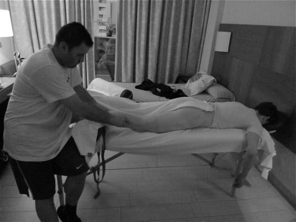 A rider enjoys a rest-day massage