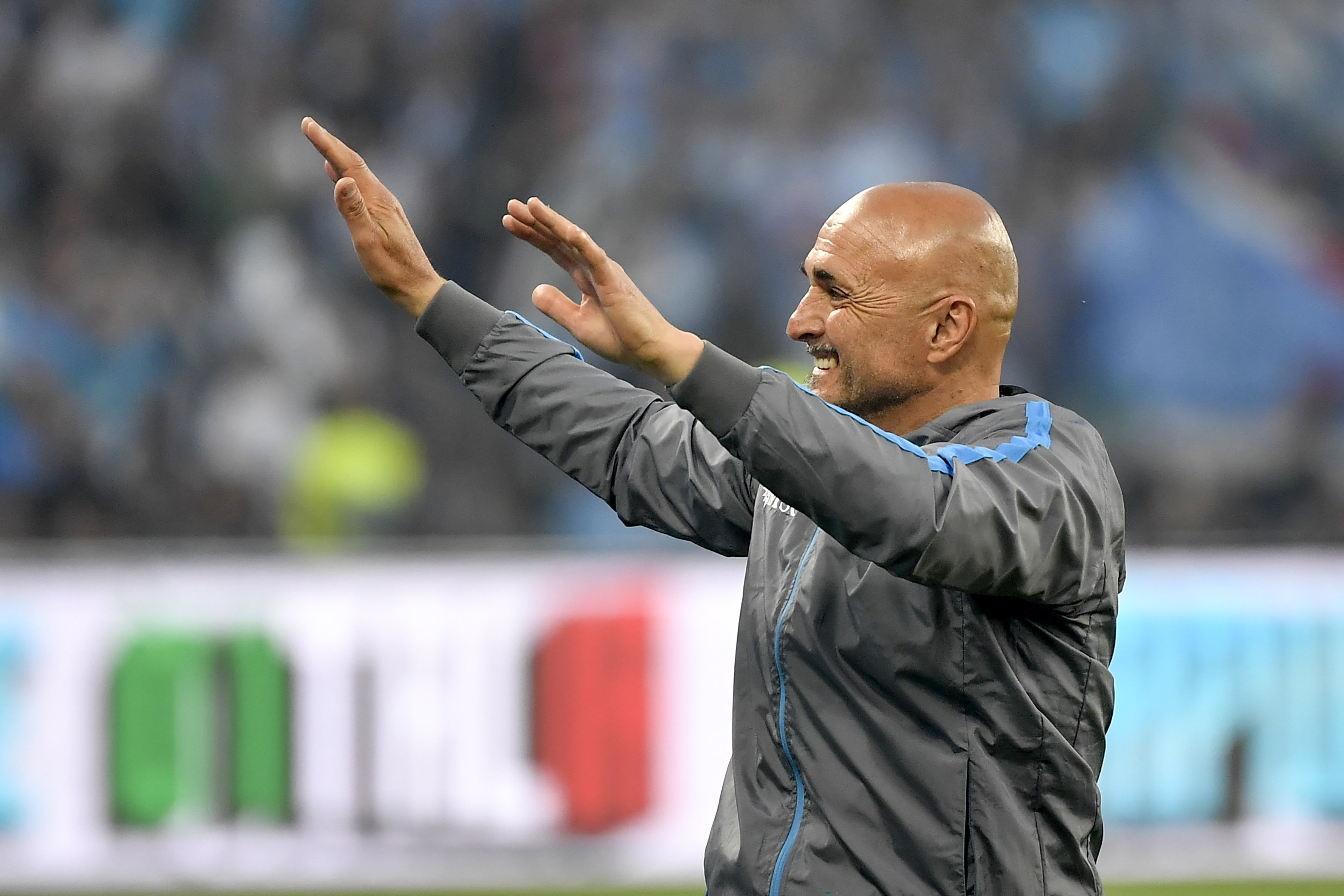 Napoli coach Luciano Spalletti salutes the fans following the club's Scudetto win in May 2023.