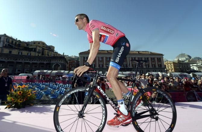 Defending Giro d'Italia champion Ryder Hesjedal at the team presentation for the 2013 Giro aboard his Cerv&eacute;lo Rca