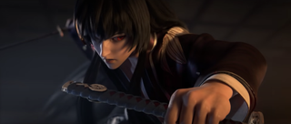 A close-up action shot of the character with long, black hair from the trailer. He’s holding two katanas, one in his left, and one in his right. He holds the one in his left behind him, ready to strike. His right hand is in the foreground, holding the katana defensively. 