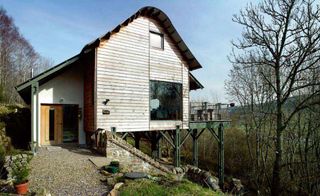 An organic contemporary home on a stunning hillside setting