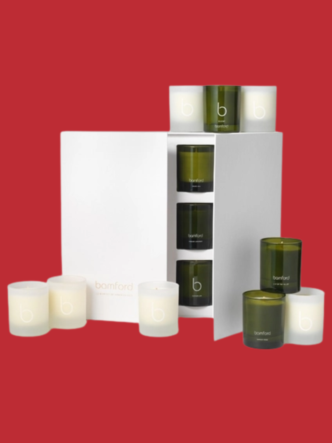 A white advent calendar from Bamford featuring twelve green and frosted glass scented candles