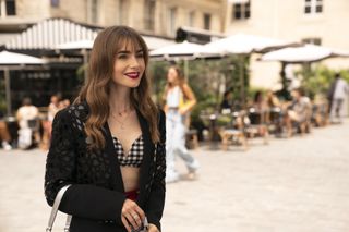 Emily In Paris Lily Collins as Emily in episode 305 of Emily In Paris Cr Stphanie BranchuNetflix 2022