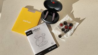 Earfun Air S wireless earbuds being tested by Live Science contributor Anna Gora
